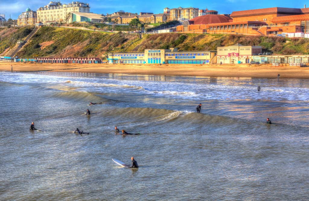 Surfing on Bournemouth Beach- one of the best things to do in Dorset